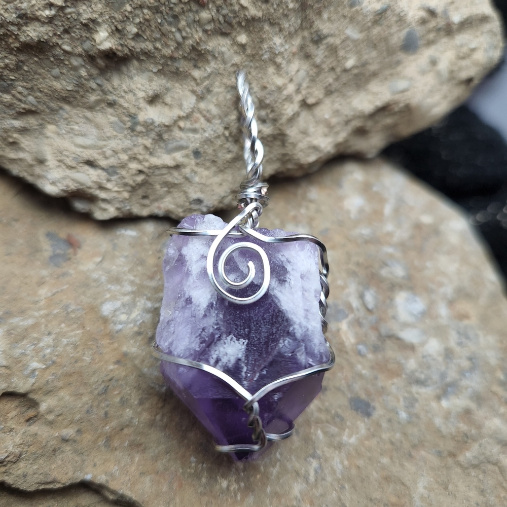 Amethyst wrapped in non tarnish silver color coated copper wire